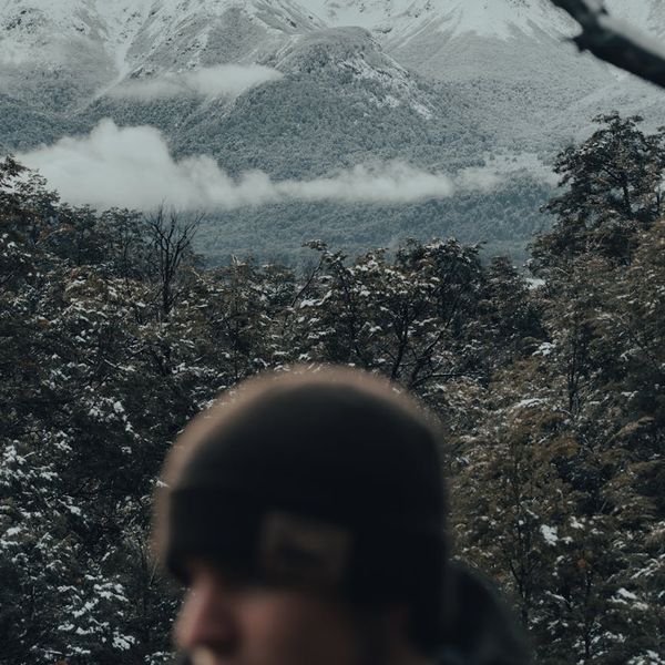 Person in a calm state meditating in a serene environment.
